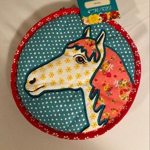 Pioneer Woman round trivet, teal background Horse on the front.